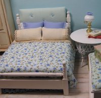 Bed Double painted white with blueberry comforter